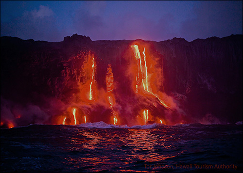 Lava flowing into the ocean at Volcanoes Nat'l Park